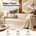 Beige sofa slipcover shown in a living room setting with matching pillows, featuring text overlays about spill-resistant waterproof surface and a circular inset demonstrating water droplets beading on the cover.