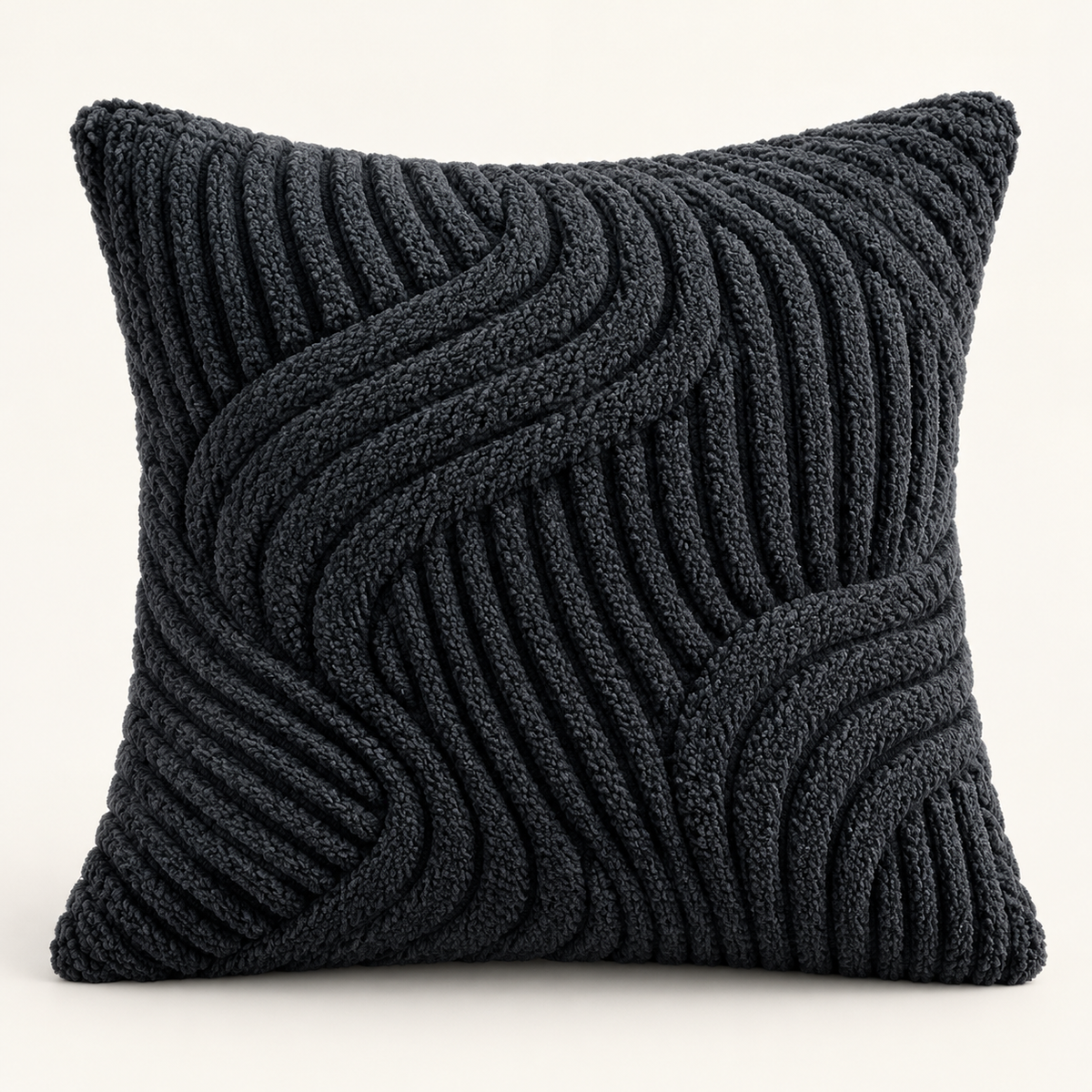 A square throw pillow in a dark charcoal gray color, featuring a textured, raised wavy pattern created by alternating thick and thin ribbed knit rows, set against a plain off-white background.