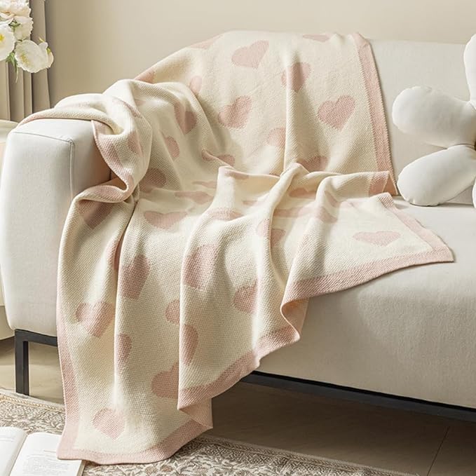 Cozy sofa blanket with heart pattern