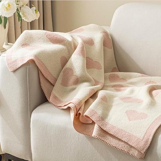 Cozy sofa blanket with heart pattern