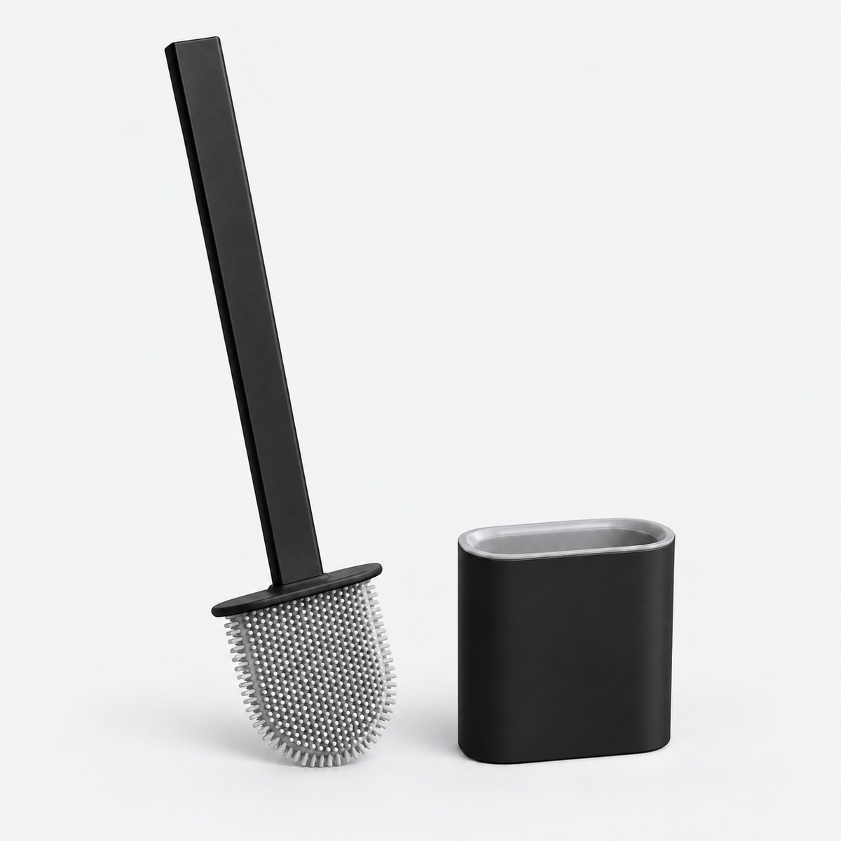 A black toilet brush with a long handle and gray bristles, shown next to its matching black cylindrical holder on a light gray background.