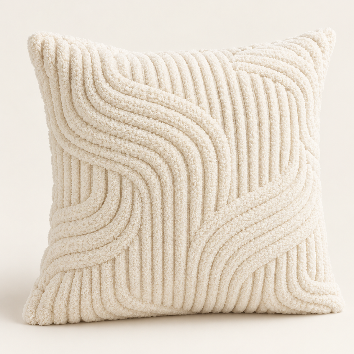 A square throw pillow in a textured cream bouclé fabric with a raised wavy ribbed pattern, shown against a solid off-white background.