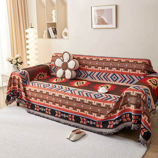 Geometric sofa cover with tassels