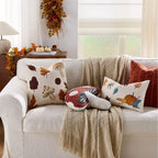 Decorative throw pillow cover featuring a Nordic maple leaf design in warm autumn colors. Made from soft, durable fabric, it adds a cozy accent to any 1