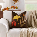 Decorative autumn throw pillow cover featuring a Nordic maple leaf design. Made from soft, durable fabric in warm orange and earthy tones, perfect for adding a 14