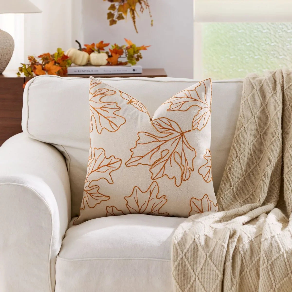 Decorative throw pillow cover featuring a Nordic maple leaf design in warm autumn colors. Made from soft, durable fabric, this accent piece adds a cozy touch 15