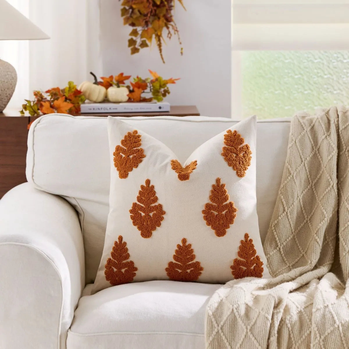 Autumn throw pillow cover featuring a Nordic maple leaf design in warm autumn colors. Crafted from soft, durable fabric, this decorative accent adds a cozy touch 7