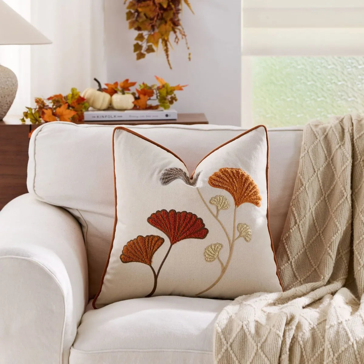 Autumn throw pillow cover featuring a Nordic maple leaf design in warm earth tones. Made from soft cotton, this decorative accent adds a cozy touch to any 9