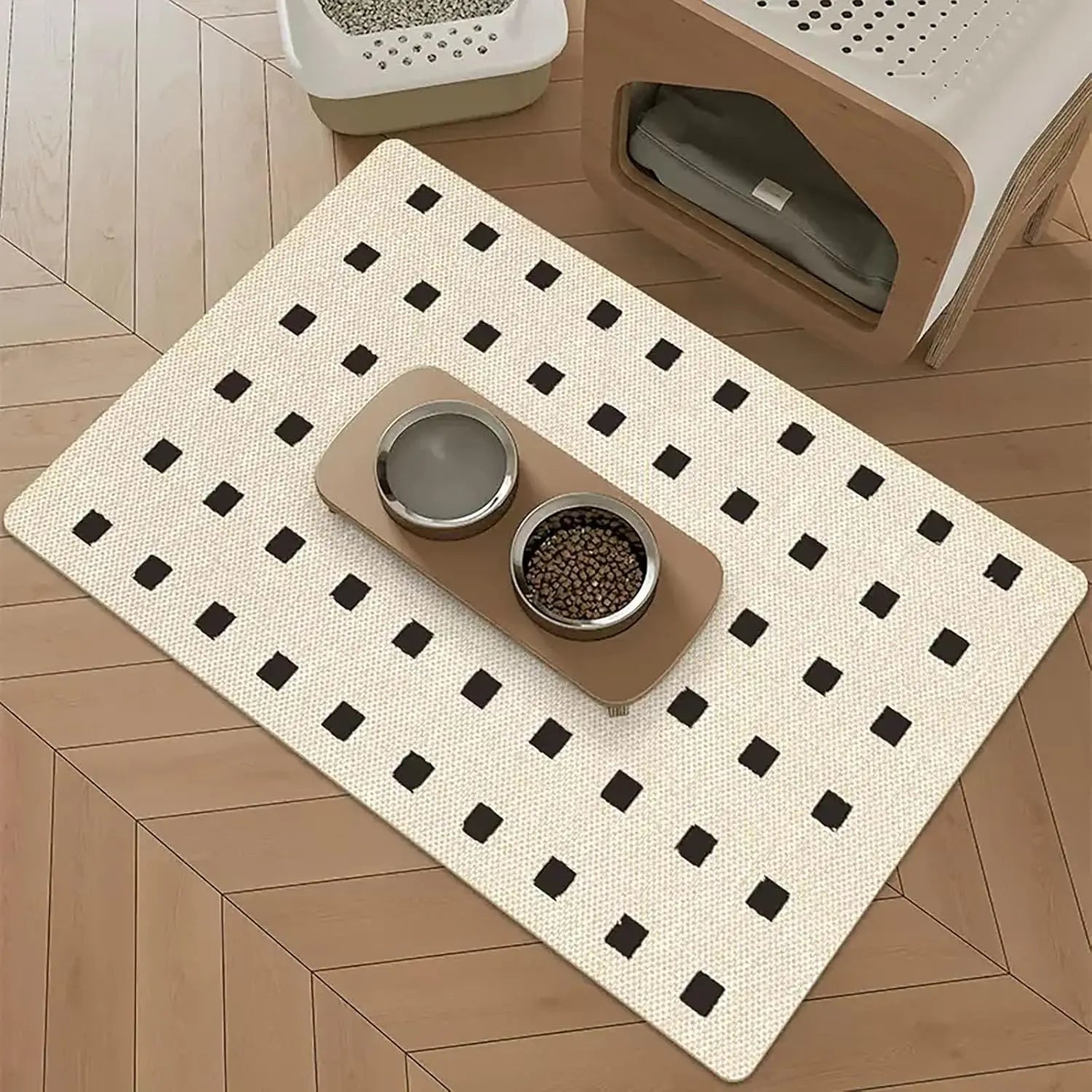 Black and white pet feeding mat featuring an absorbent, scratch-resistant surface. Ideal for protecting floors during mealtime, the mat showcases a modern geometric pattern 1