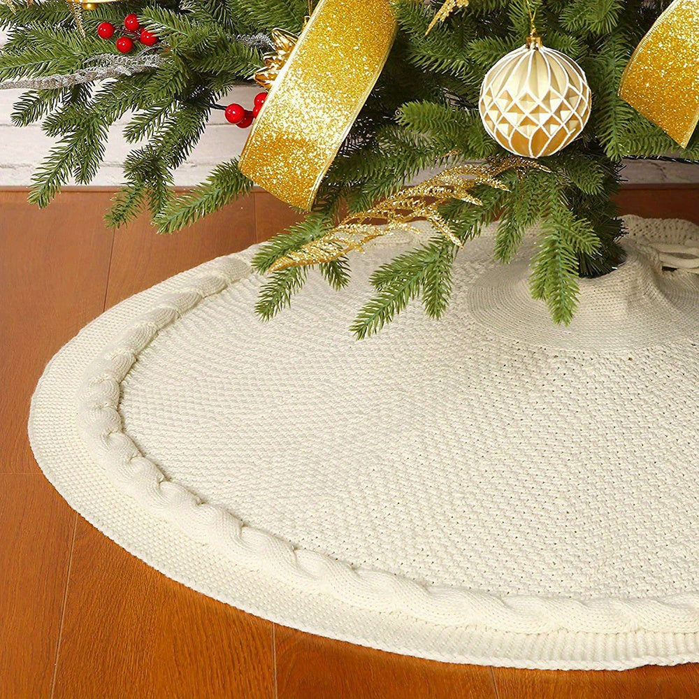 Cozy round Christmas tree skirt in soft cream color with a textured cable knit pattern, perfect for holiday decor. Adds a warm and festive touch to your 5