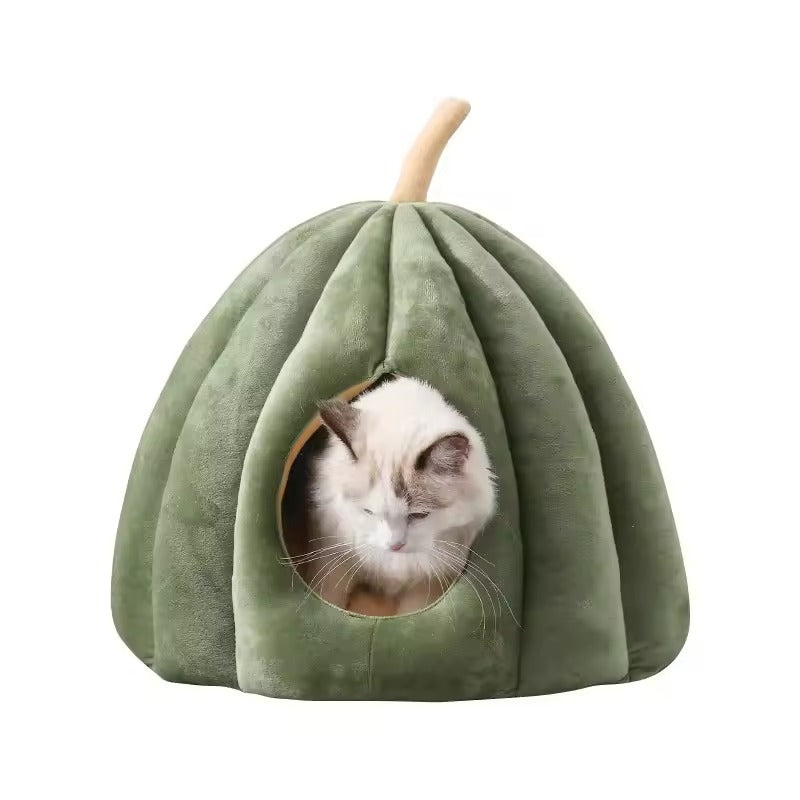 Cozy cat cave bed in soft plush fabric featuring a green pumpkin design. Measures 19.7 x 19.7 x 15.7 1