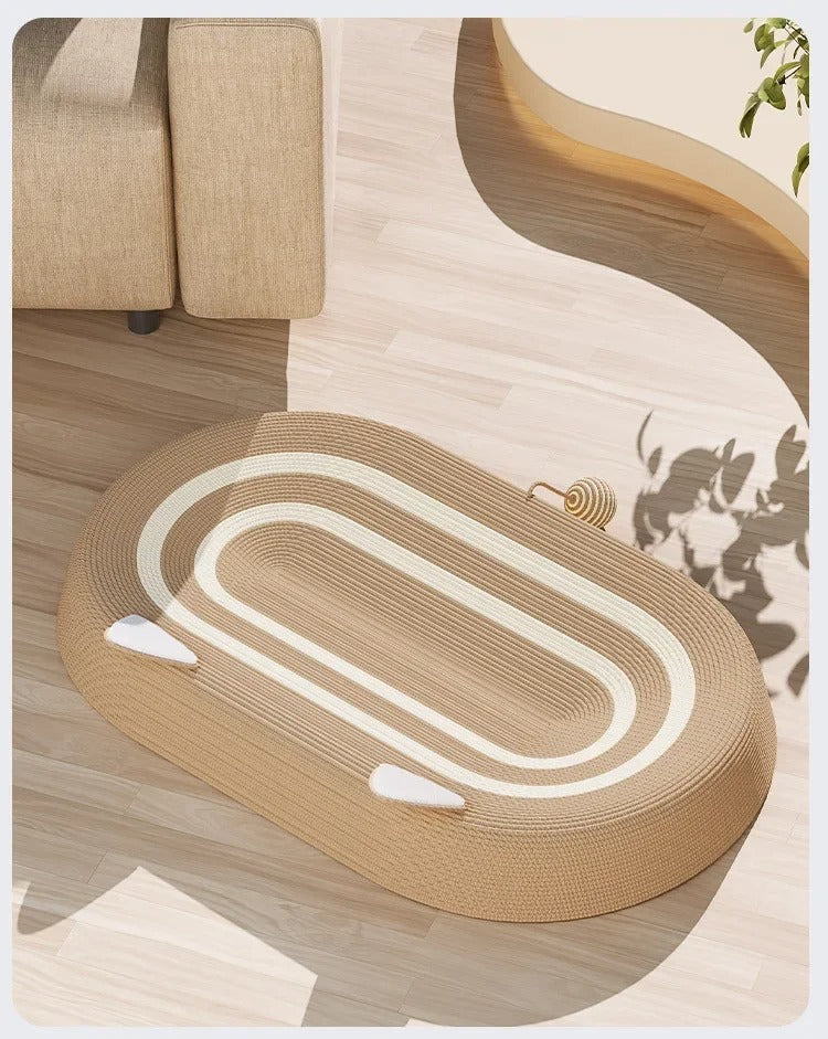 Beige cat scratcher bed made from natural sisal, featuring white accents. Designed as an interactive play zone for cats, measuring 24 x  3