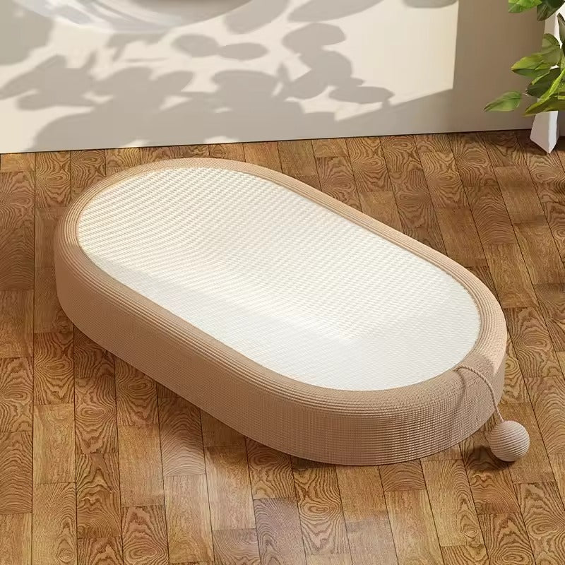 Beige cat scratcher bed made from natural sisal, featuring white accents. This interactive play zone measures 24 x 15.7 x  8