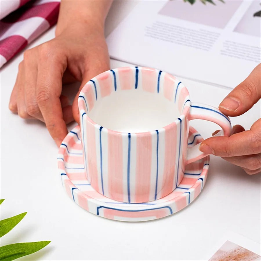 Handpainted ceramic coffee cup and saucer set featuring a charming French retro design. The set showcases intricate floral patterns in soft pastel colors, perfect for 7