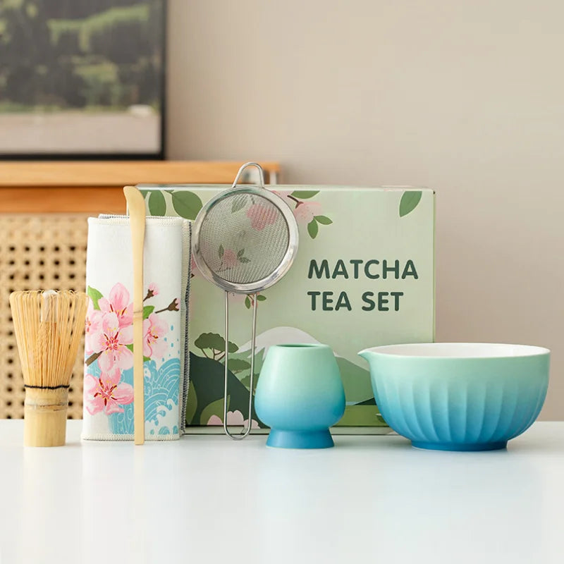 Colorful 6-piece ceramic matcha bowl set featuring unique spouts for easy pouring. Each bowl displays vibrant, hand-painted patterns, perfect for tea 0