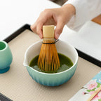 Colorful 6-piece ceramic matcha bowl set featuring unique spouts for easy pouring. Each bowl displays vibrant, hand-painted patterns, perfect for tea 3