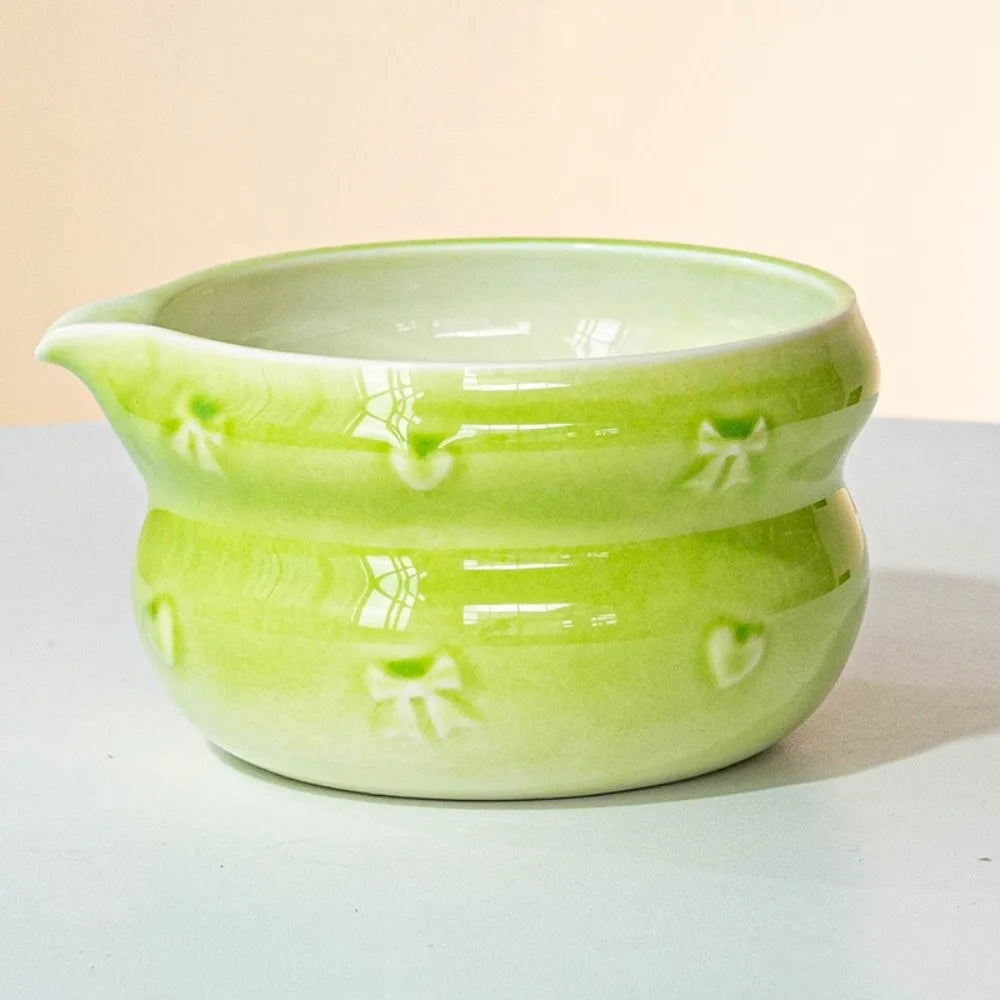 Ceramic matcha bowl with spout, featuring a beautiful gradient color design. Ideal for preparing and serving matcha tea, showcasing a smooth finish and 13