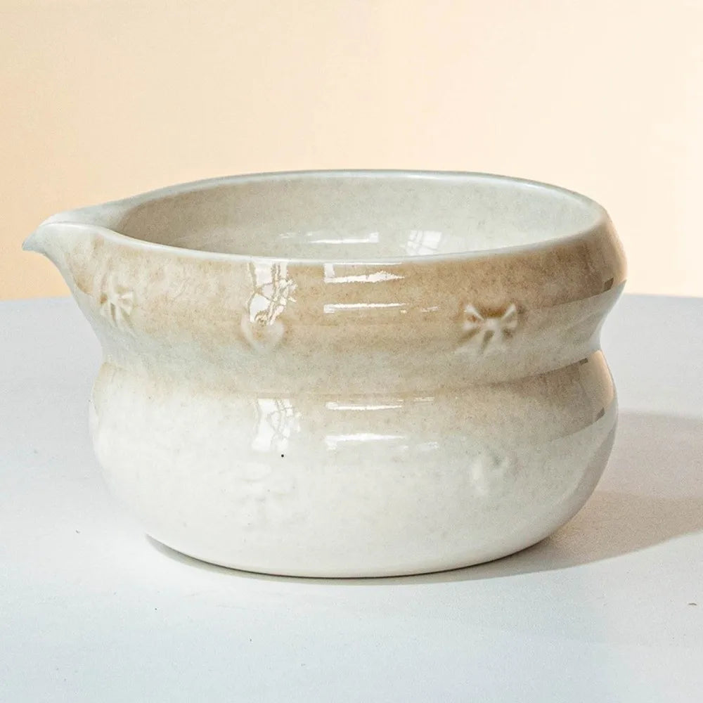 Ceramic matcha bowl with spout, featuring a beautiful gradient color design. Ideal for preparing and serving matcha tea, showcasing a smooth finish and 7