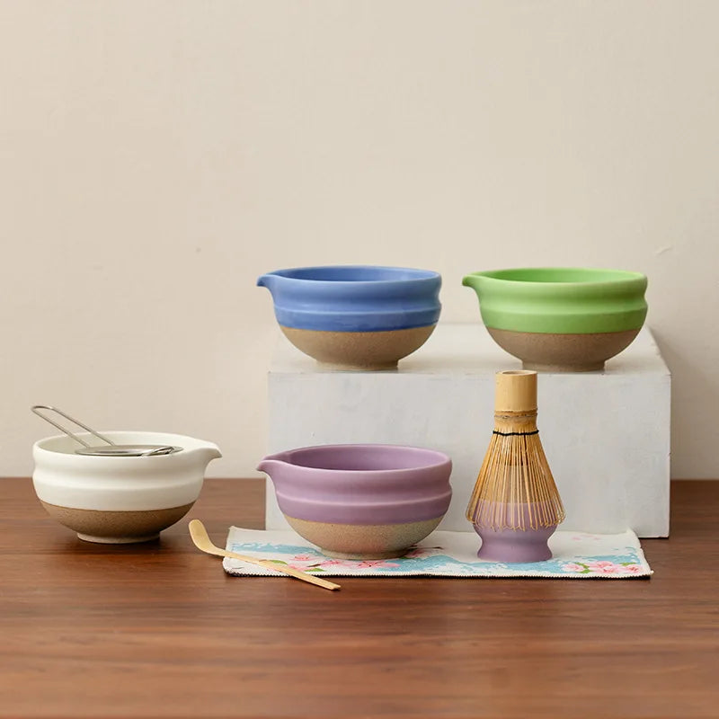 Elegant ceramic matcha tea set featuring a smooth green bowl, bamboo whisk, spoon, and matching accessories, perfect for preparing traditional matcha. The set 2