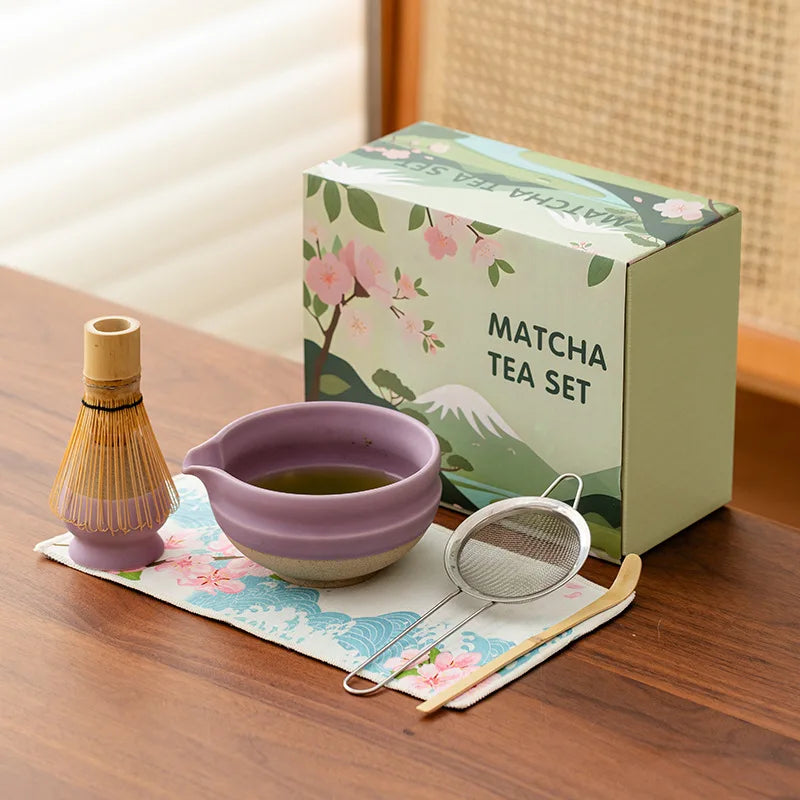 Elegant ceramic matcha tea set featuring a smooth green bowl, bamboo whisk, spoon, and matching accessories, perfect for preparing traditional matcha. The set 3