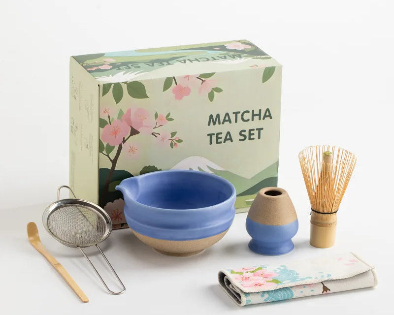 Elegant ceramic matcha tea set featuring a smooth green bowl, bamboo whisk, spoon, and matching accessories, perfect for preparing traditional matcha. The set 7