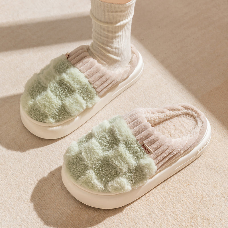 Cozy checkered plush women's slippers in soft gray and white, featuring a fluffy interior for warmth and comfort. The anti-slip sole ensures safety on various 4