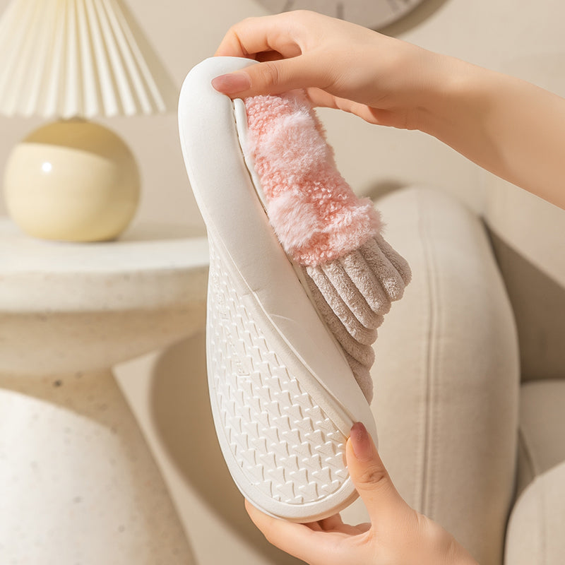 Cozy checkered plush women's slippers featuring an anti-slip sole, perfect for home wear. Soft fabric provides warmth and comfort, ideal for lounging. Classic 7