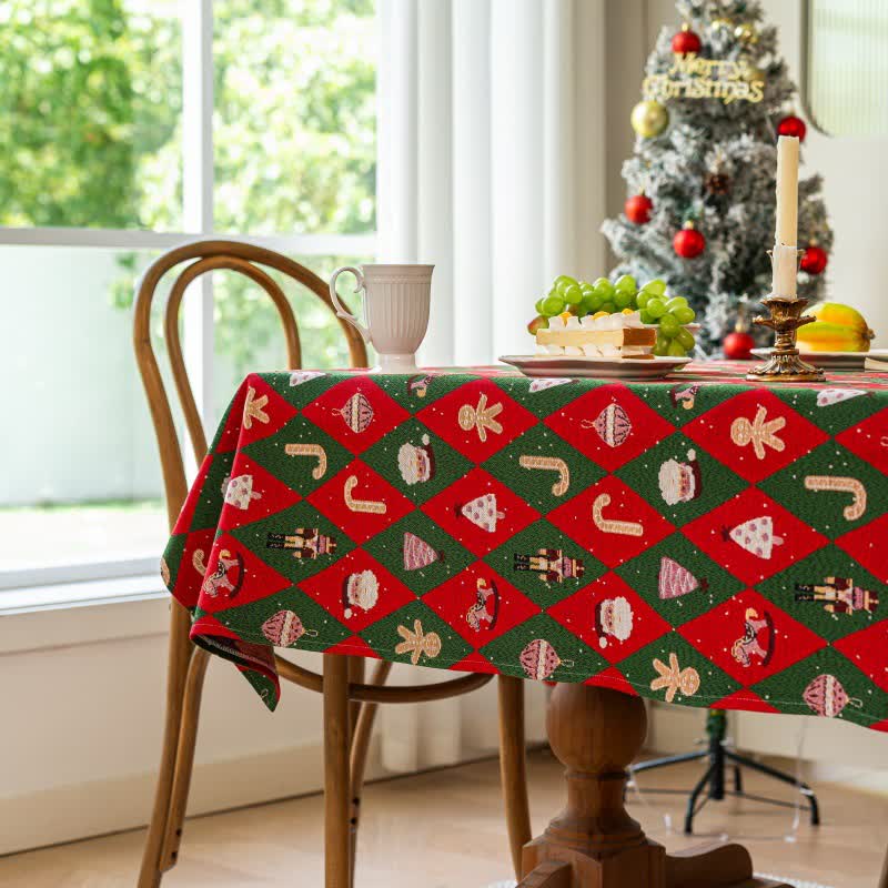 Red and green diamond plaid Christmas tablecloth featuring festive holiday motifs. Made from durable fabric, it adds a cheerful touch to holiday gatherings and enhances your dining 0