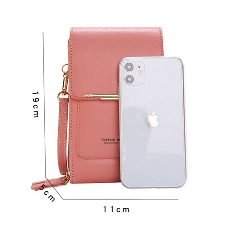 Compact crossbody phone bag in sleek black faux leather, featuring a convenient card holder and adjustable strap. Ideal for hands-free use, this stylish accessory combines 2