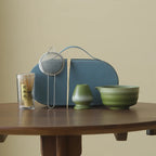 Compact Japanese matcha tea set featuring a stoneware bowl and bamboo whisk, perfect for preparing matcha. The earthy tones of the stoneware enhance the 0