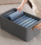 Stylish gray cotton linen storage basket with sturdy handles, designed for easy carrying. Foldable for convenient storage, perfect for organizing toys, clothes, or 2
