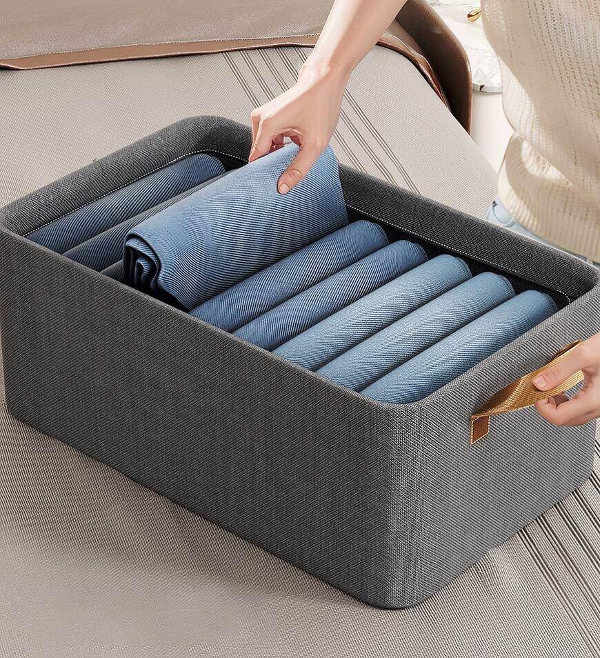 Stylish gray cotton linen storage basket with sturdy handles, designed for easy carrying. Foldable for convenient storage, perfect for organizing toys, clothes, or 2