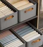 Stylish gray cotton linen storage basket with sturdy handles, designed for easy carrying. Foldable for convenient storage, perfect for organizing toys, clothes, or 4