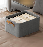 Stylish gray cotton linen storage basket with sturdy handles, designed for easy carrying. Foldable for convenient storage, perfect for organizing toys, clothes, or 6