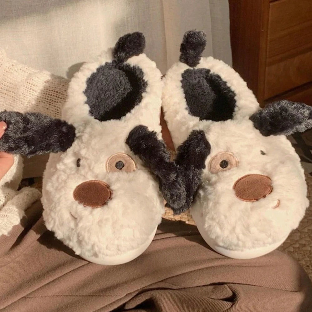 Cozy women's slippers featuring a fluffy Dalmatian print design, crafted for indoor comfort. Soft faux fur material in black and white spots, perfect for 0