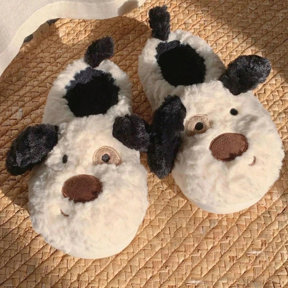Cozy women's slippers featuring a fluffy design in a playful Dalmatian print. Made from soft, plush material for ultimate indoor comfort. Ideal for lounging 1