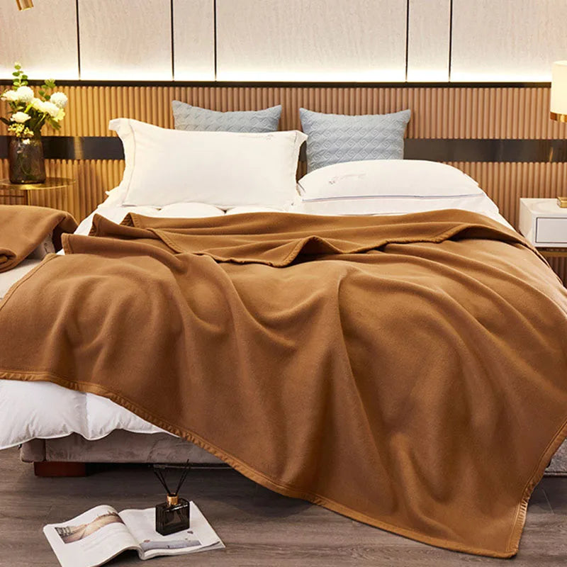 Cozy double-sided camel velvet blanket, perfect for all-season warmth. Luxuriously soft texture and rich color enhance any decor. Ideal for snuggling 0