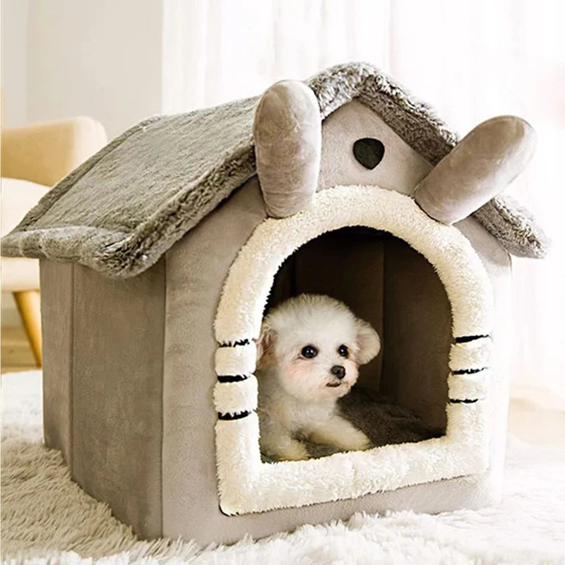Cozy indoor dog house featuring a soft flannelette bed with a removable cushion. The structure is plush gray with a simple design, providing a warm 0