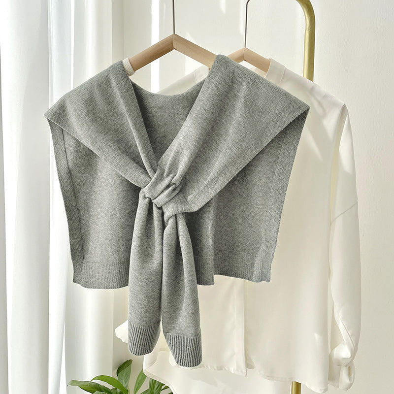 Soft, stylish cream knit shawl wrap, perfect for all seasons. Features a cozy, lightweight design that drapes elegantly. Versatile for layering with 4