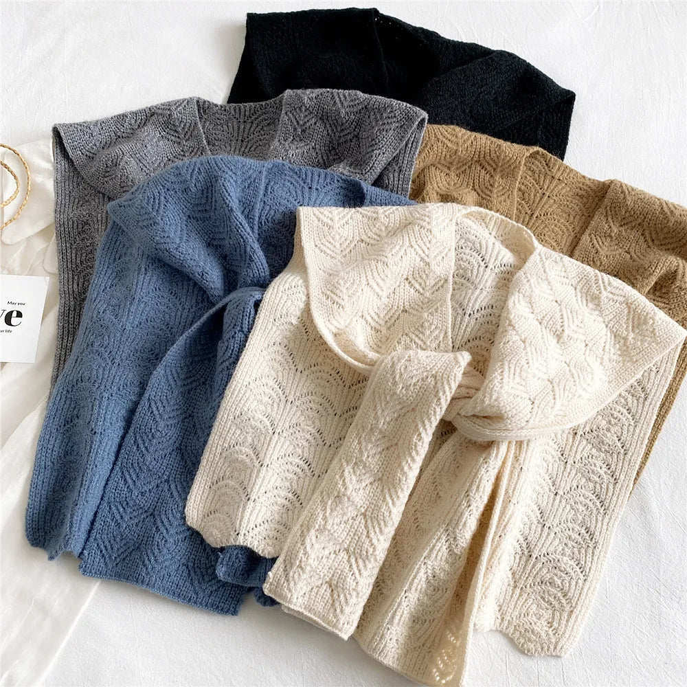 Cozy knitted shawl in warm autumn tones, featuring a textured design perfect for layering. Made from soft, breathable fabric, it adds a stylish touch 2