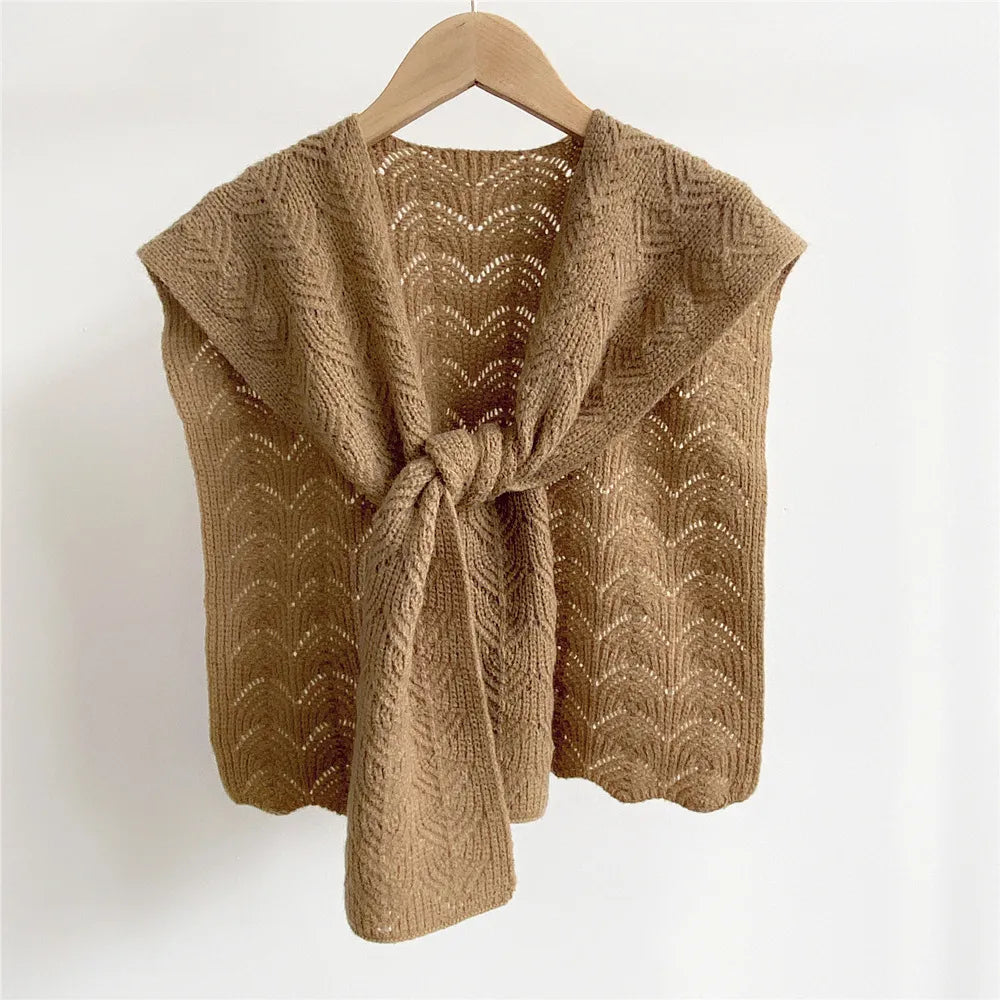 Cozy knitted shawl in warm autumn tones featuring a textured pattern, perfect for stylish layering. Made from soft, breathable fabric, it adds warmth and 4