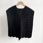 Cozy knitted shawl in warm autumn tones featuring a blend of orange, brown, and mustard hues. Perfect for stylish layering, this soft, lightweight 7