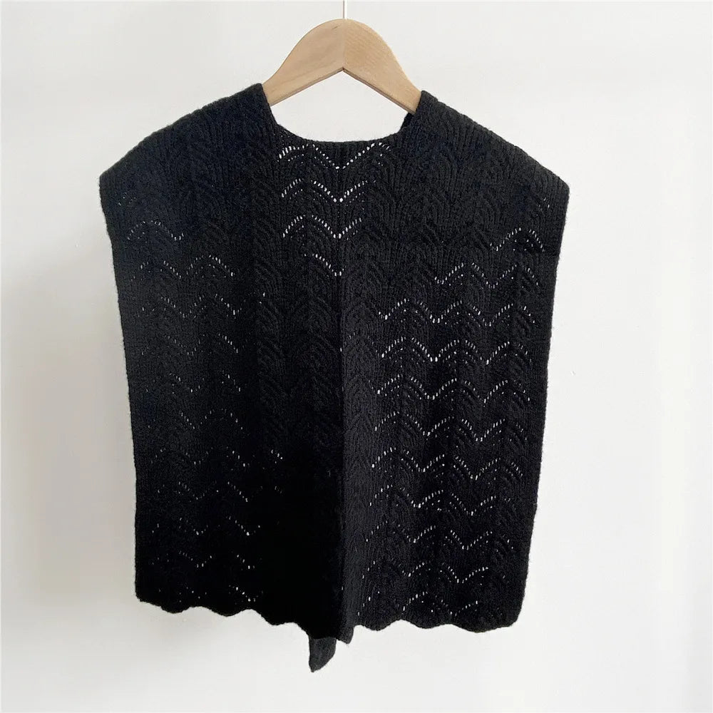 Cozy knitted shawl in warm autumn tones featuring a blend of orange, brown, and mustard hues. Perfect for stylish layering, this soft, lightweight 7