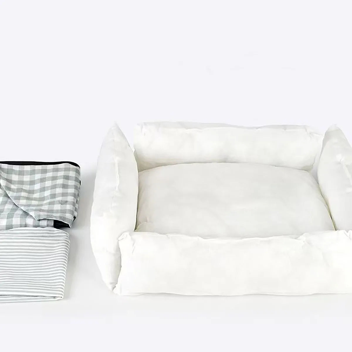 Cozy plaid dog bed for small dogs, featuring a soft fabric cushion with a stylish checkered pattern in warm tones. Perfect for pets to snuggle 5