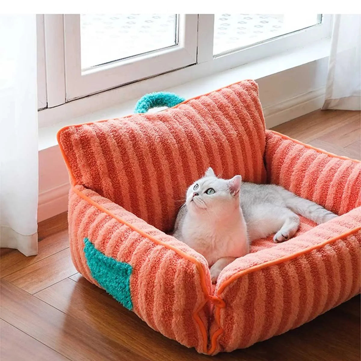 Cozy plush cat bed featuring stylish stripes, designed for small dogs and cats. Made from soft, durable fabric in a blend of pastel colors, providing 2