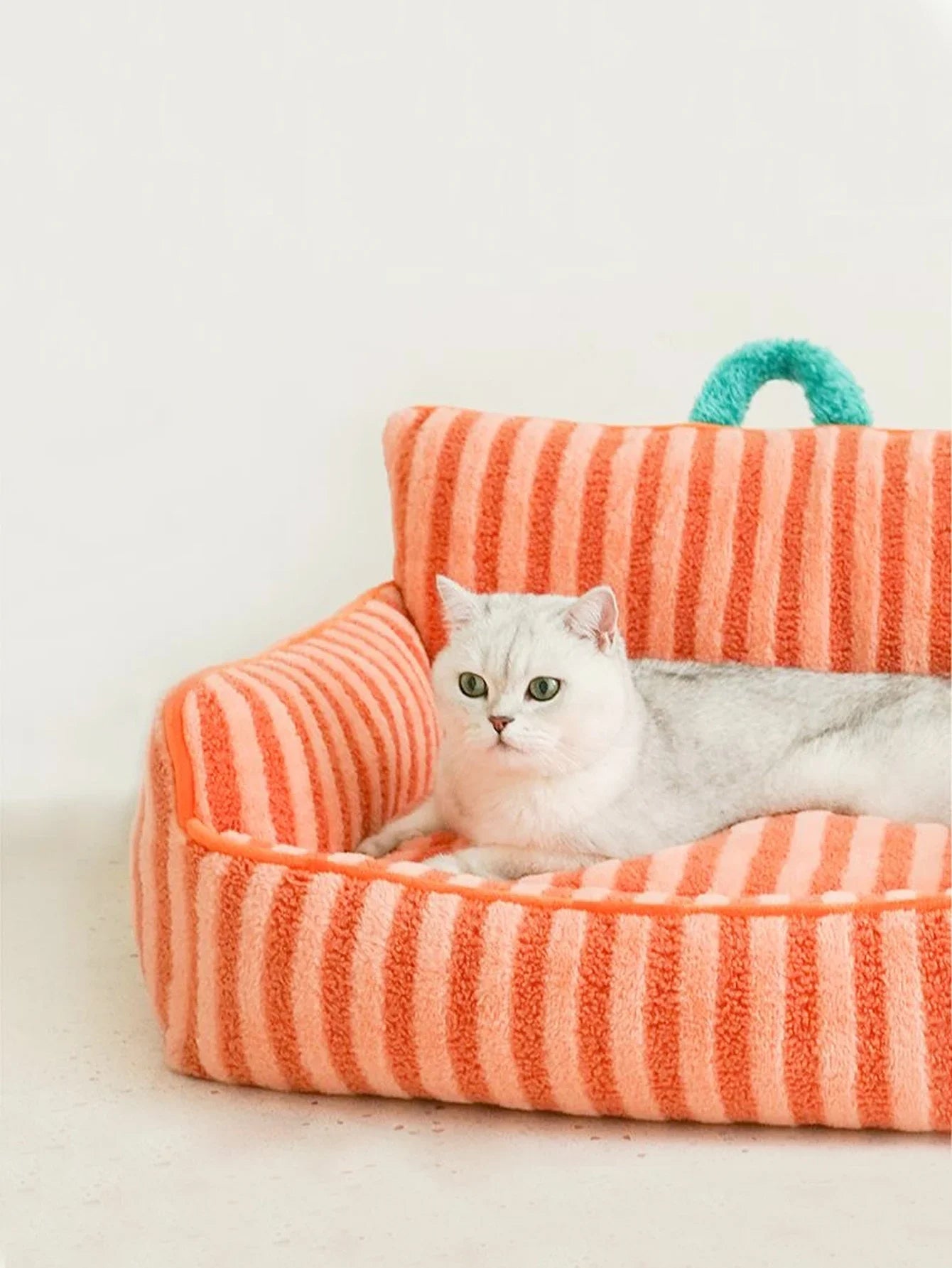Cozy plush cat bed featuring stylish stripes, designed for small dogs and cats. Made from soft, durable fabric in a chic color palette, providing comfort 6