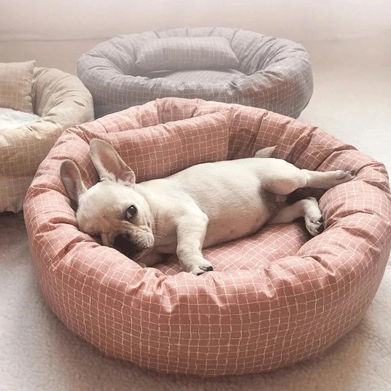 Light gray cozy plush dog bed designed for small to medium pets, featuring a soft, padded surface for ultimate comfort and a stylish, contemporary look. Perfect 0