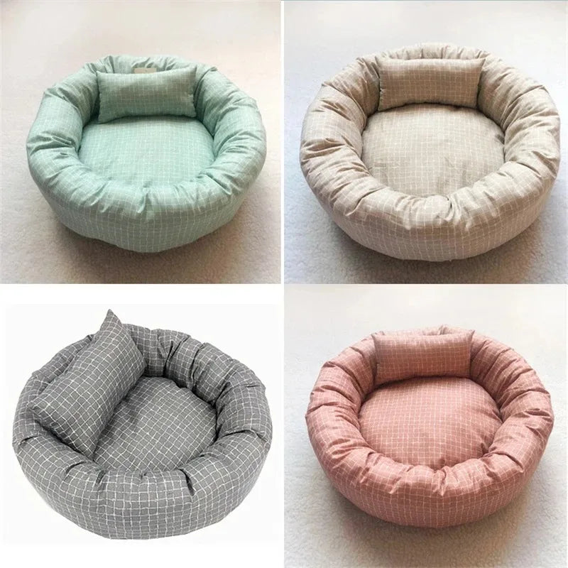 Light gray plush dog bed designed for small to medium pets, featuring a cozy, soft surface and supportive edges for comfort. Ideal for lounging and napping 5