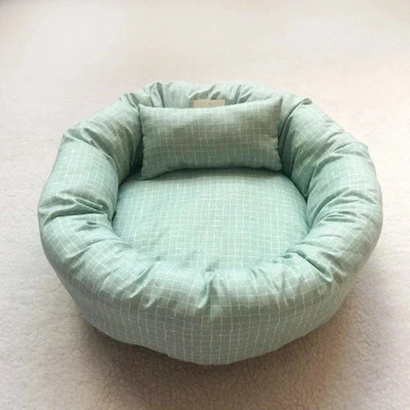 Cozy plush dog bed in light gray, designed for small to medium pets. Features a soft, padded surface for comfort and a stylish, modern design 9