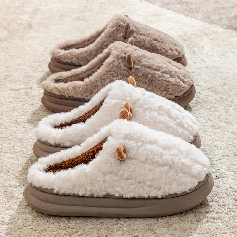 Cozy women's slippers made of plush fleece-lined cotton, perfect for winter comfort. Features a soft, warm design in a gentle gray color, ideal for 0